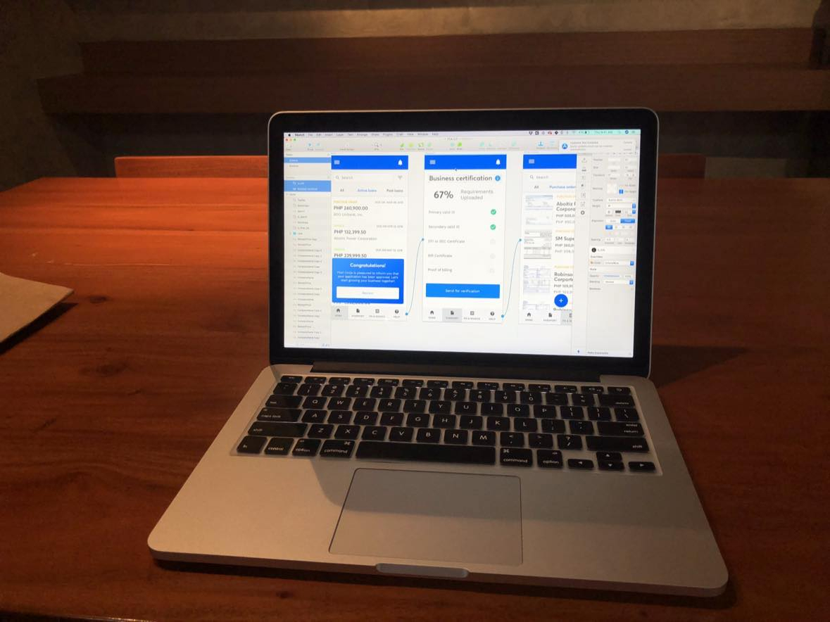 A photo of my work laptop working on UX flows
